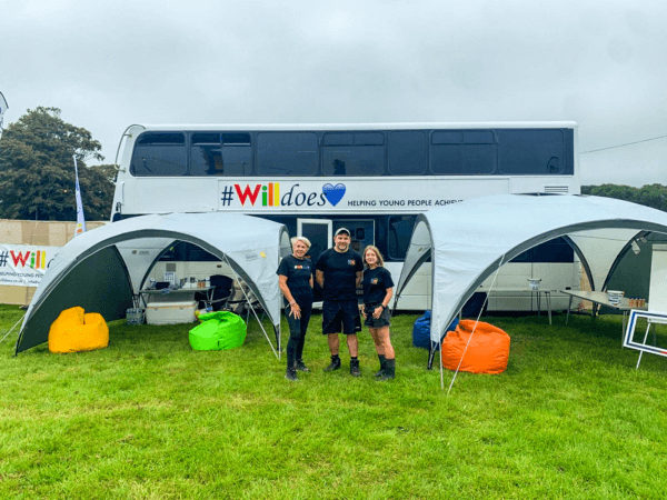 The WillDoes bus, with team members from Dorset Youth.